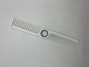 spinning white barber comb