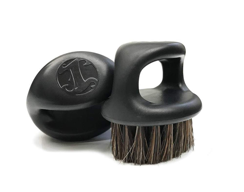 Irving barber company black [knuckle brush].